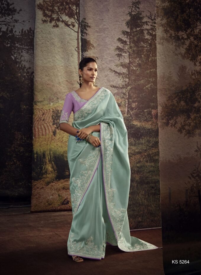 Elegant Pastel Green and Silver Silk Saree with Embroidered Purple Blouse